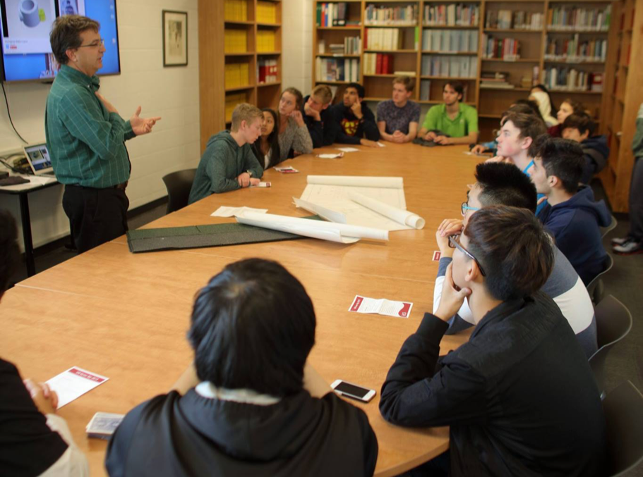 LCS students listen to a presentation about how to prepare for careers in engineering