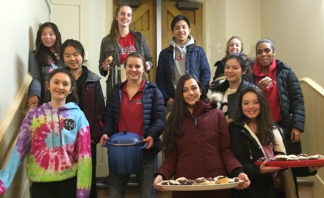 LCS students gather food for those in need while volunteering for the local initiative, Out of the Cold.